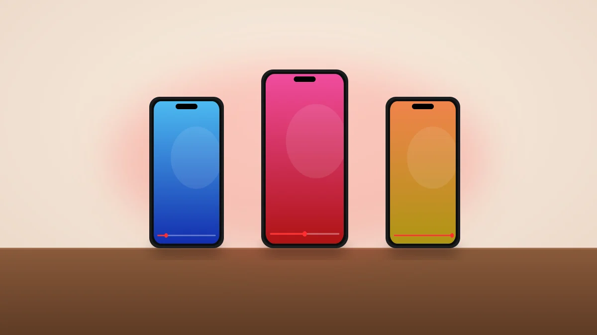 Three phones on a table, each playing a Short with a red progress bar at a different point.